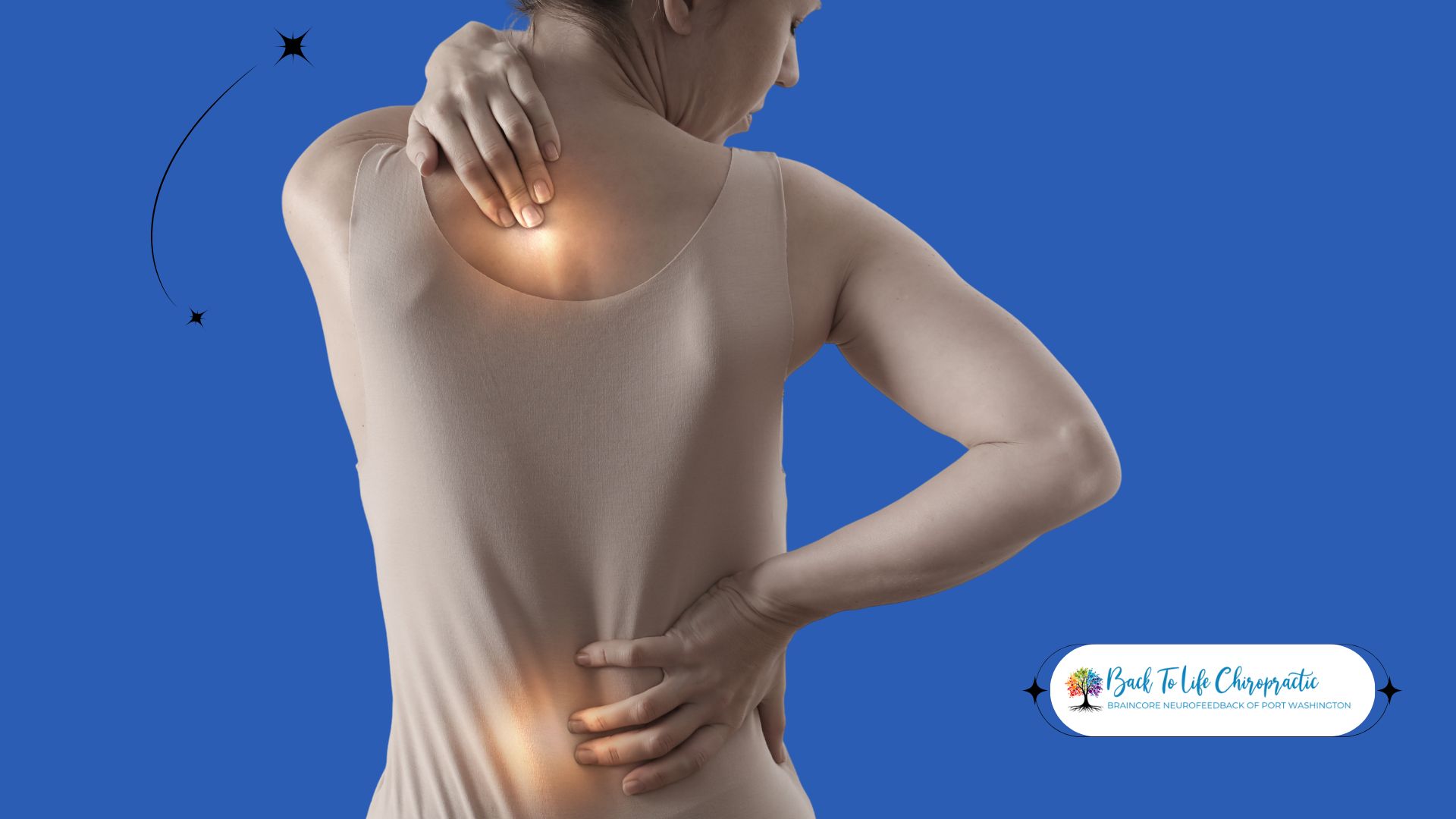 Patient speaking with a chiropractor in a clinical setting, reviewing spine models and treatment plans.